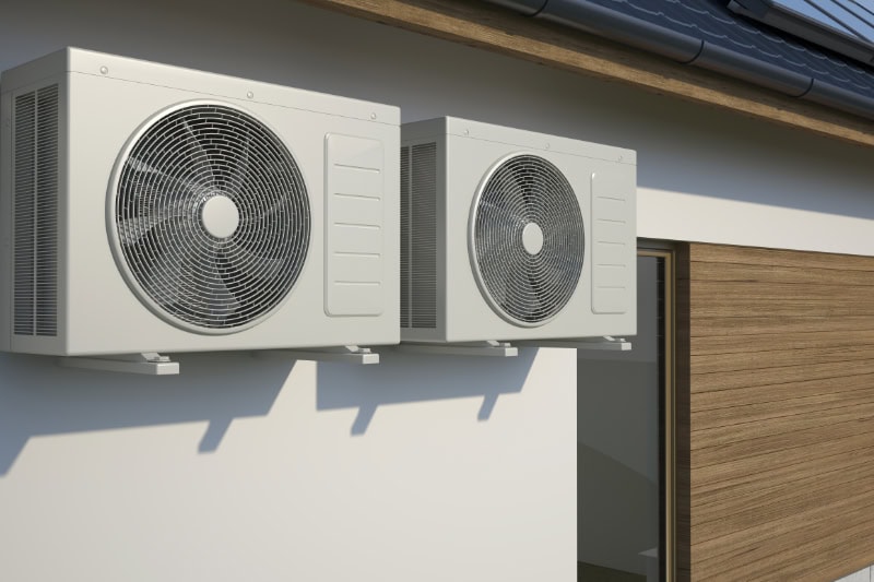 Air conditioner units outside of a building.